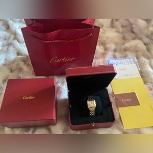 Cartier Women's Gold Watch with Silver Dial